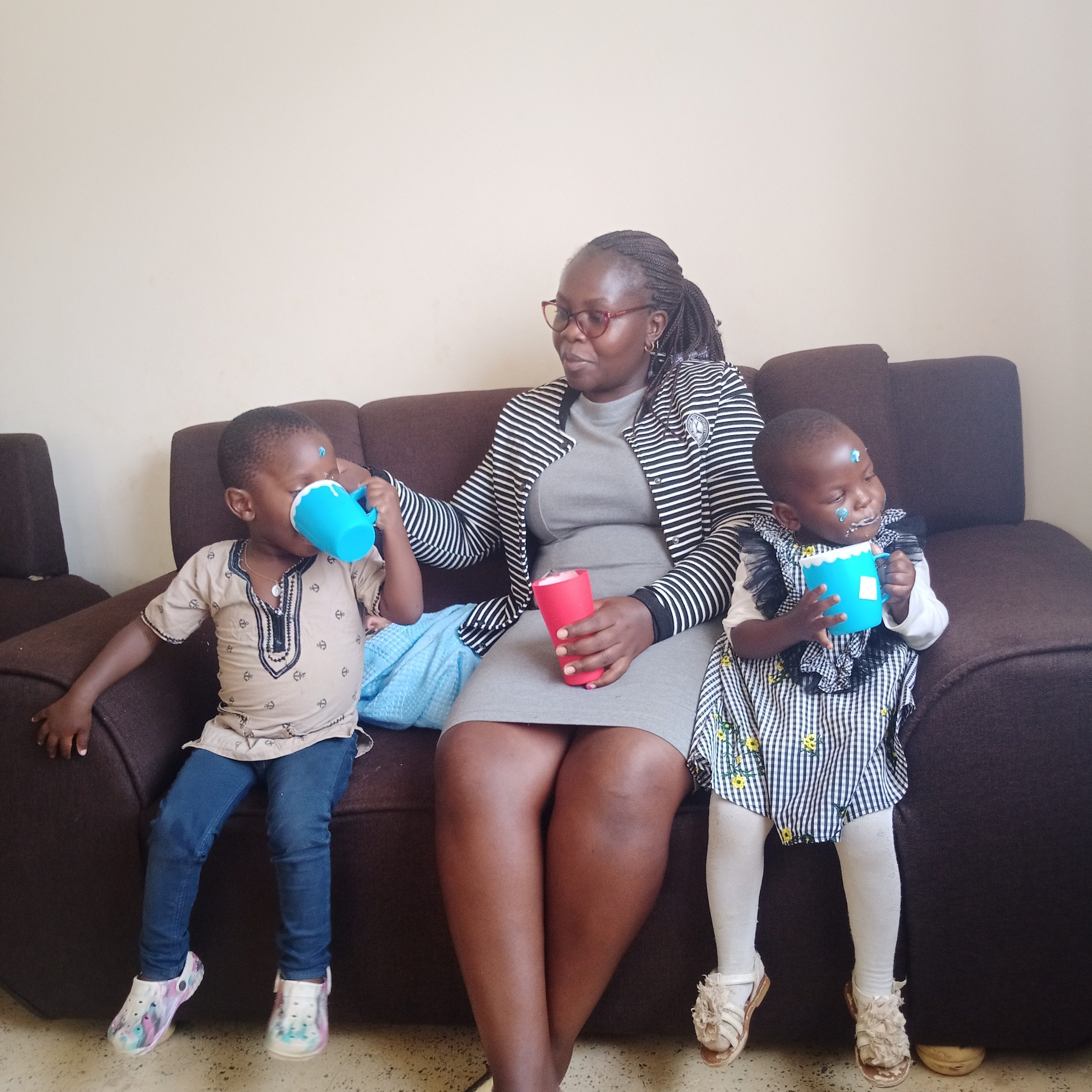 auma Judith - Adoptive mother to Martha